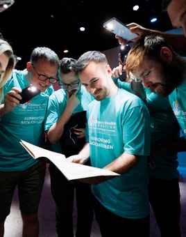 Corporate team solving puzzles during a problem solving team building activity in Ireland with Dynamic Events