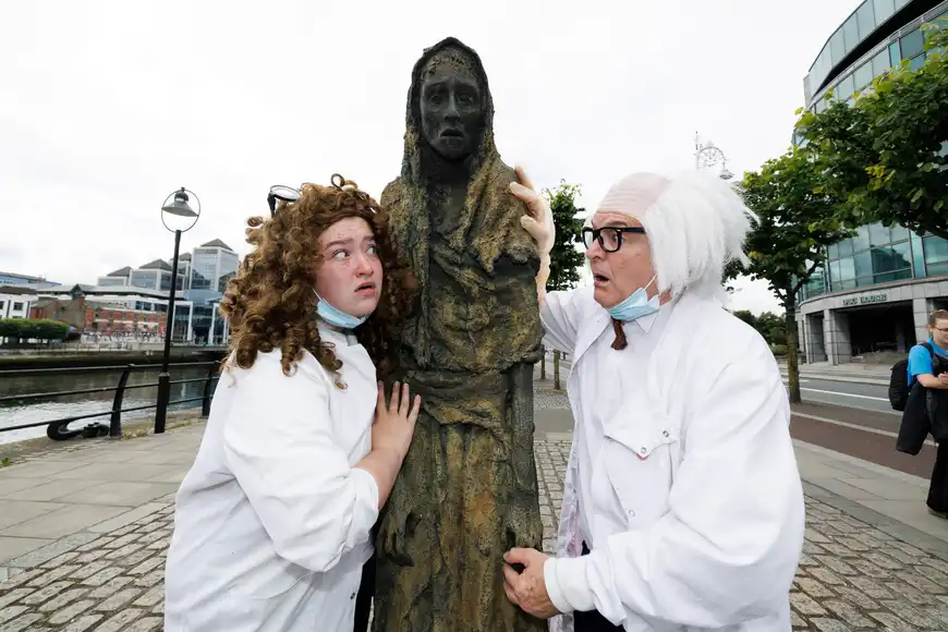 Actors in mad scientist costumes running a Halloween themed team building event in Dublin city
