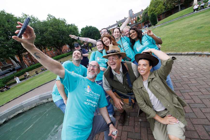 Corporate team activities Ireland outdoor explorer themed event group selfie