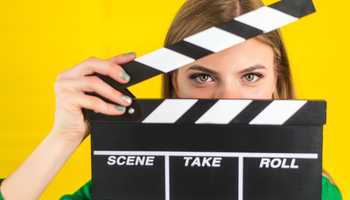women with clapper board