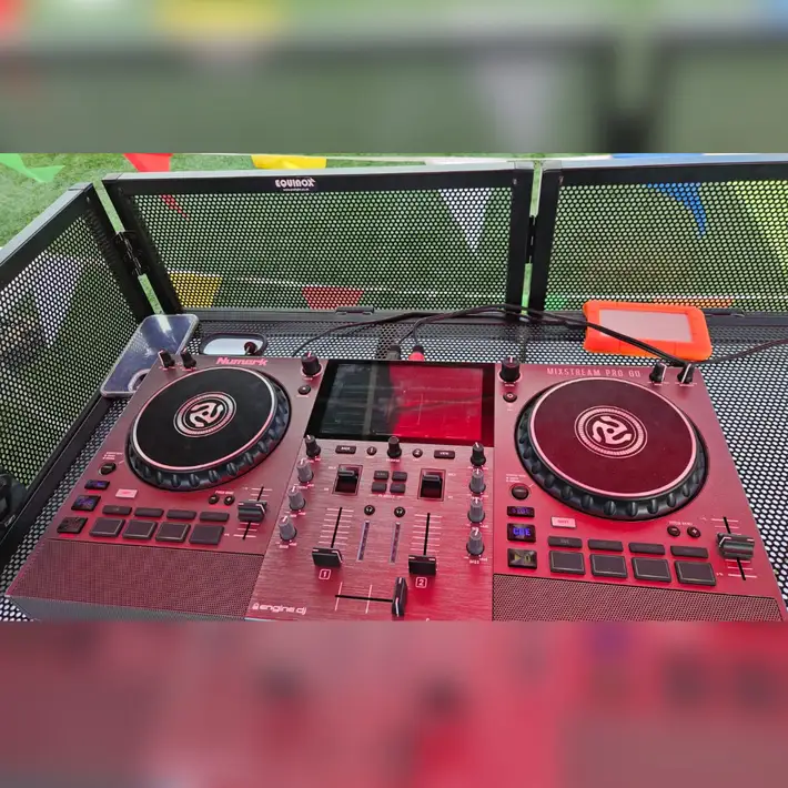 DJ booth for the adults at the Corporate Family Day with a blurry background