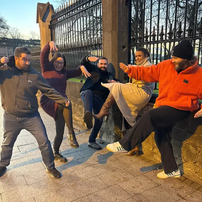 Kraków team striking a creative pose for a Digital Treasure Hunt task during Uber’s multi city team building event.
