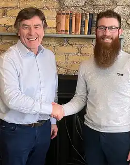 Richard Phelan and Niall O’Connor shaking hands as Dynamic Events announces new Managing Director in Dublin, Ireland