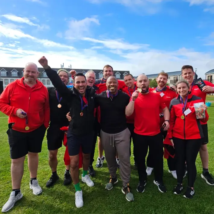 Hilti team celebrating with medals after winning Team Olympics at The Johnstown Estate summer party