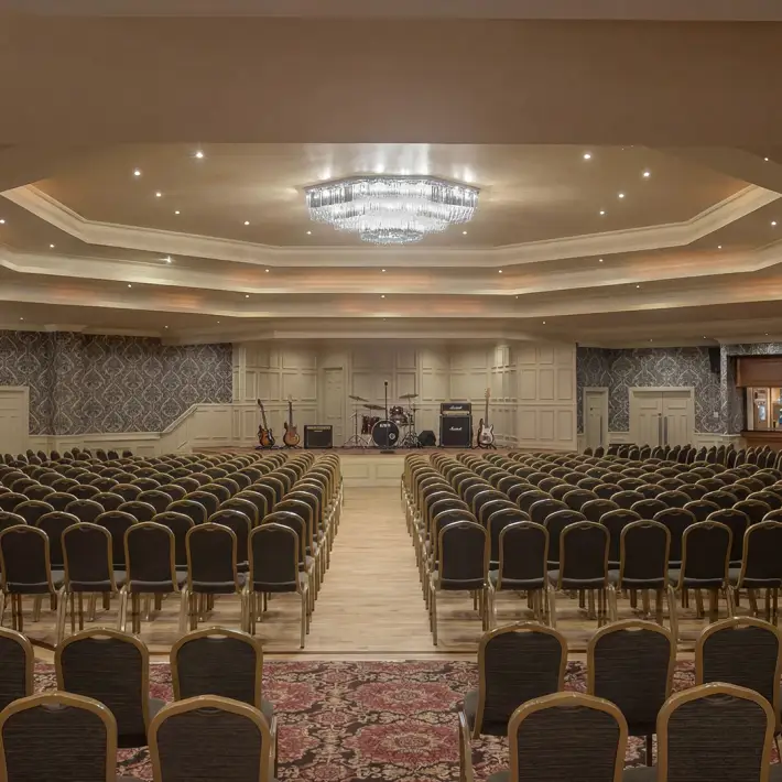 Conference and event space with theatre-style seating and stage at Hotel Kilmore in Cavan