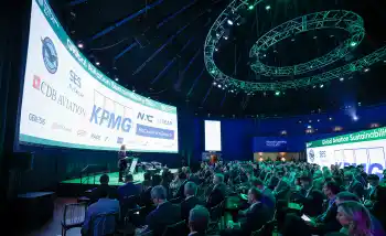 Corporate conference in Ireland with full audience, professional stage setup, and branded screens at Global Aviation Sustainability Day