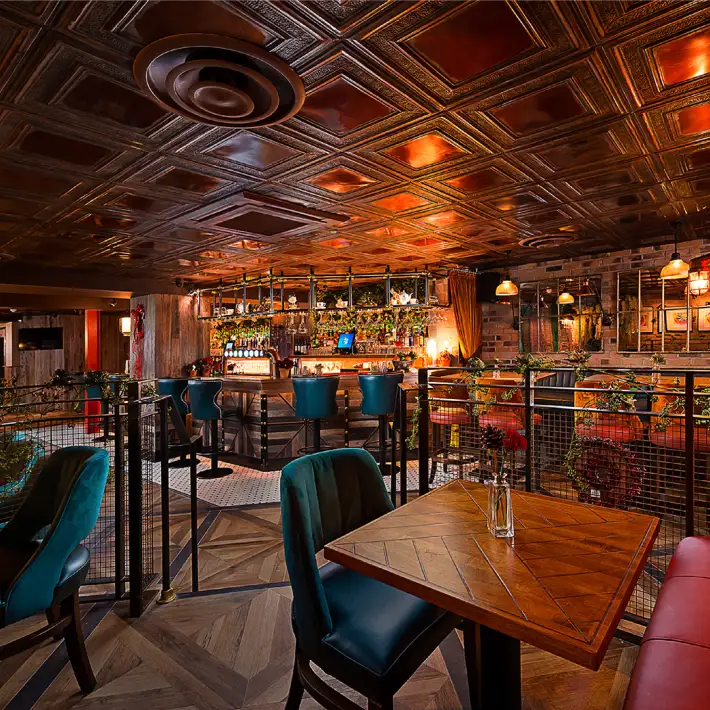 Piano Bar at 101 Limerick with dining tables, lounge seating and a stylish private event setting.