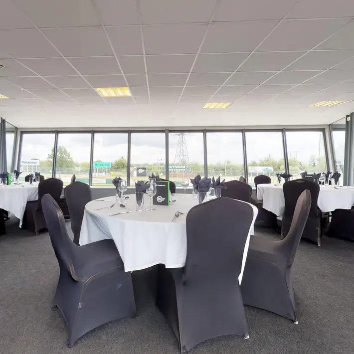 Ballroom set up with round tables and chairs 
