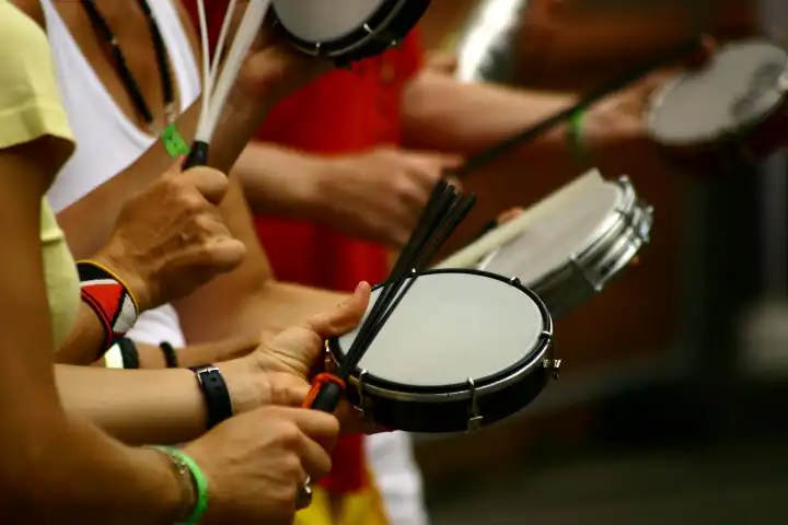 people having drumming lesson