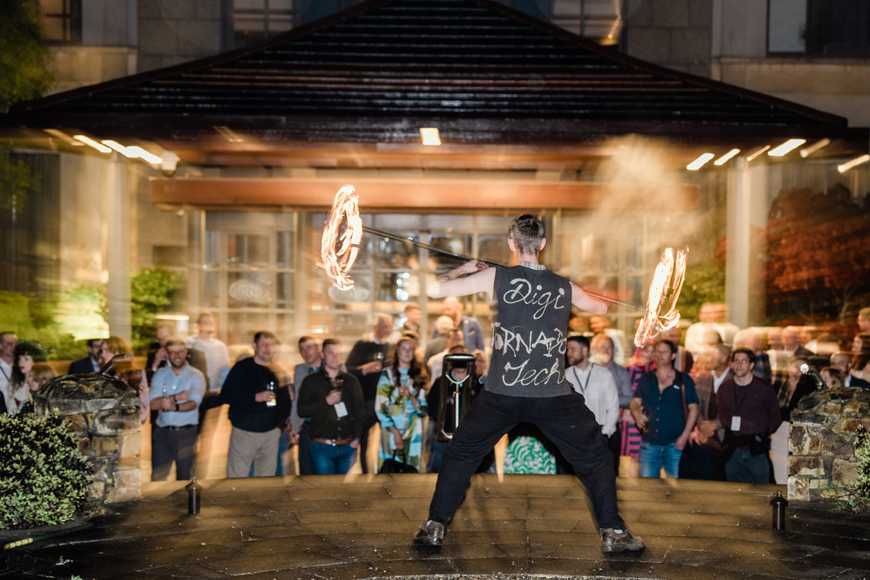 Fire performer performing with evening entertainment 