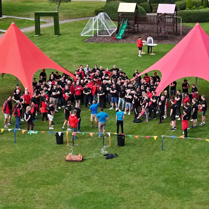 Drone overview of Hilti Ireland team taking part in Rocket Challenge team building activity at summer party