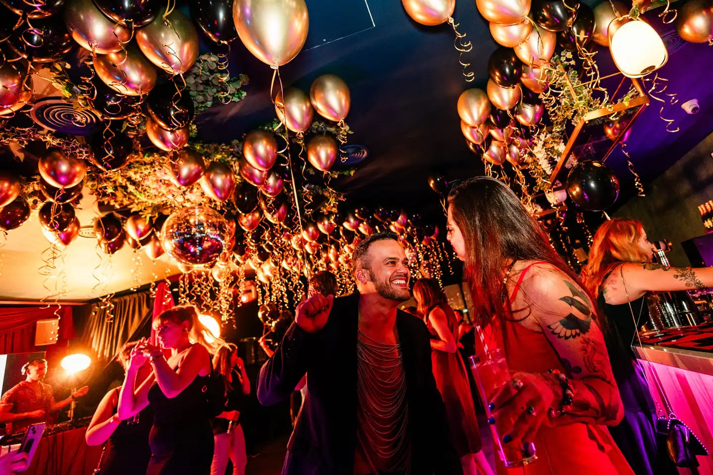 Christmas Birthday Party for WIX with decorations and people dancing