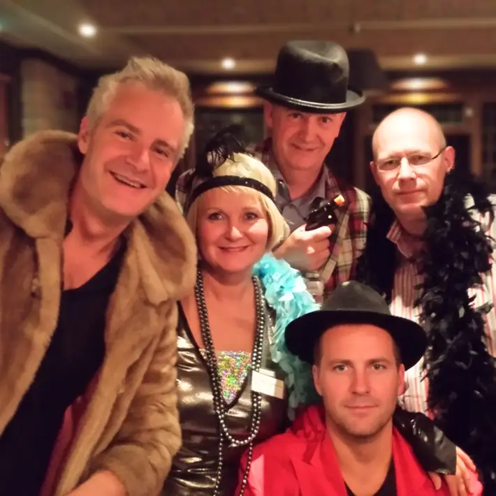 people dressing up during the murder mystery activity