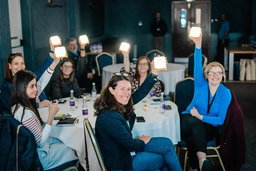 Corporate team raising solarbuddies in an interactive CSR team building workshop in Ireland.