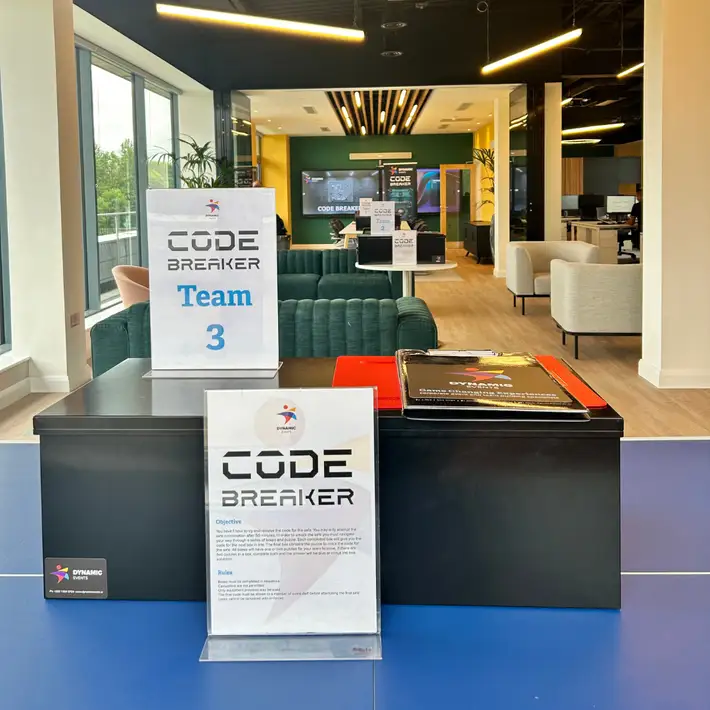 Code breaker set up with signs and boxes