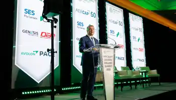 Man on a stage talking at the ALI 2025 Summit