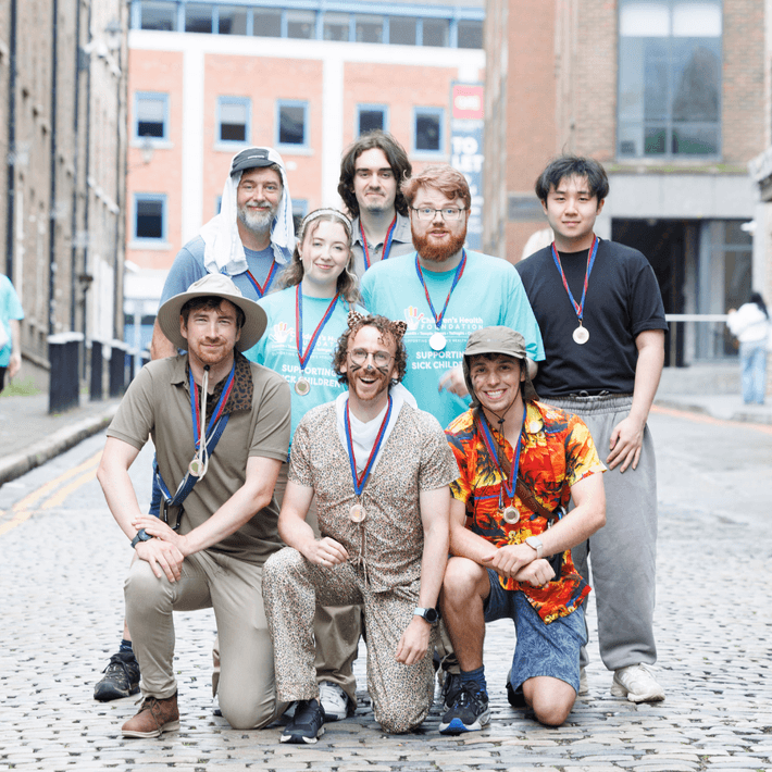 Participants celebrating at the end of a Halloween digital treasure hunt.