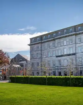 The Hardiman Exterior With Green Grass