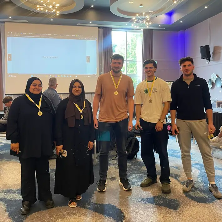 Winning team celebrating after a Dynamic Events graduate programme team building activity for Sisk
