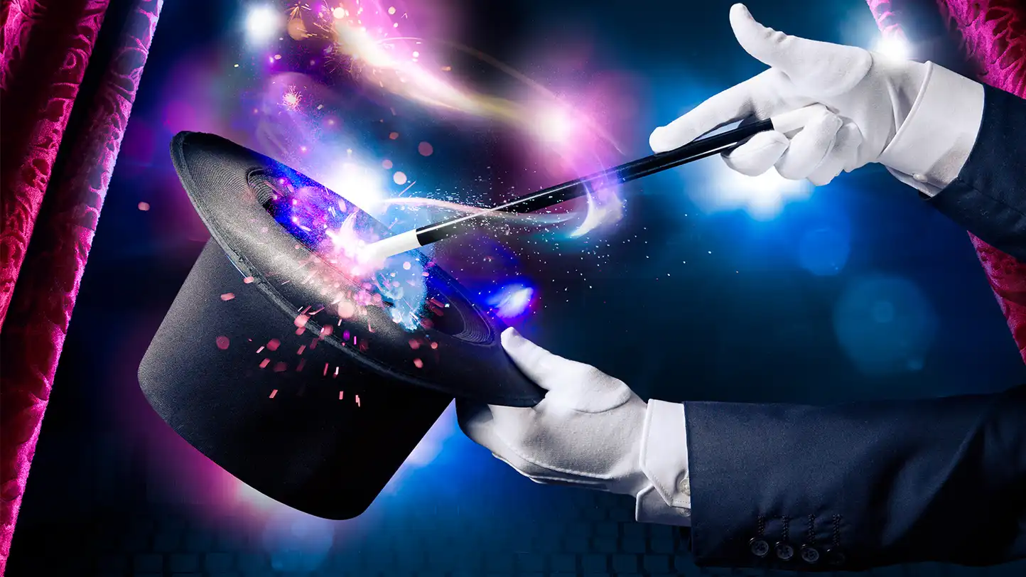 magician trick with wand and hat
