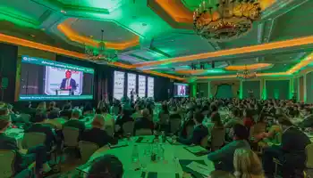 Large corporate conference in Dublin with stage, screens and full audience managed by Dynamic Events Ireland