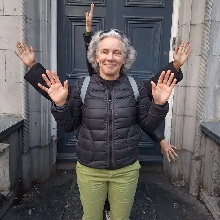 Fidelity Investments employee posing with extra arms for a creative photo challenge during the Galway City digital treasure hunt.