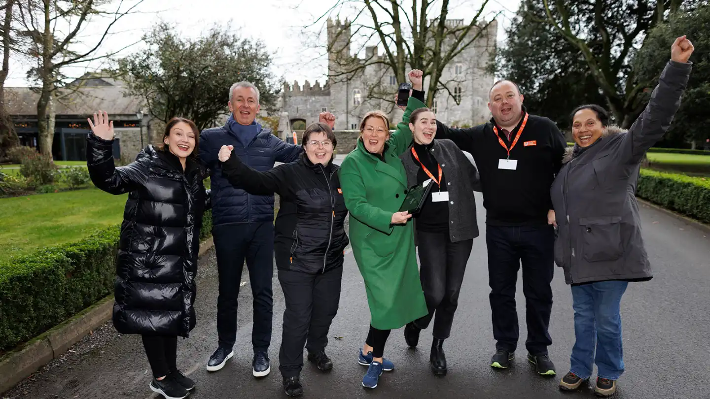 Team taking part in an outdoor team building activity in Ireland