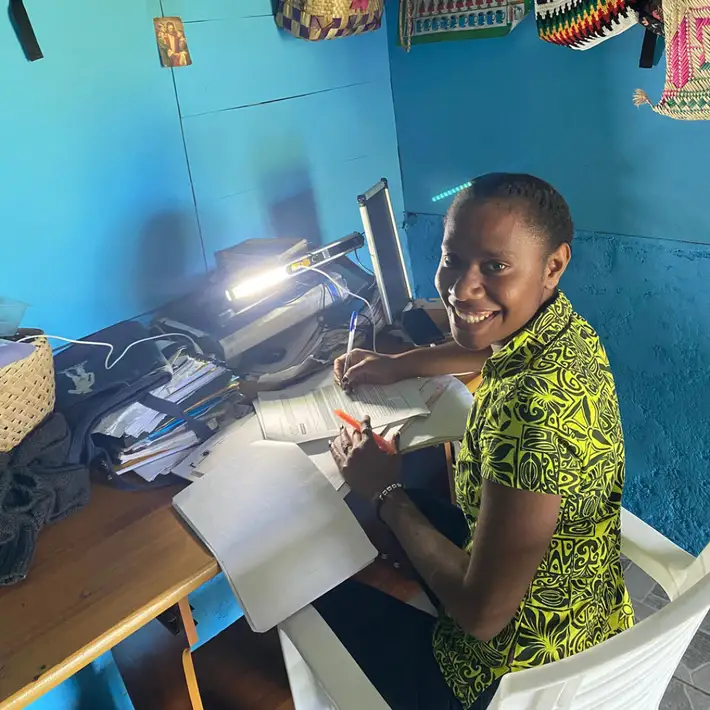 girl studying with her new solar light