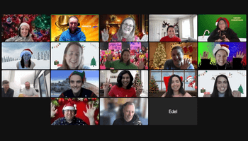 Corporate team on a virtual Christmas party call with festive backgrounds and Santa hats, hosted online for remote teams in Ireland and abroad