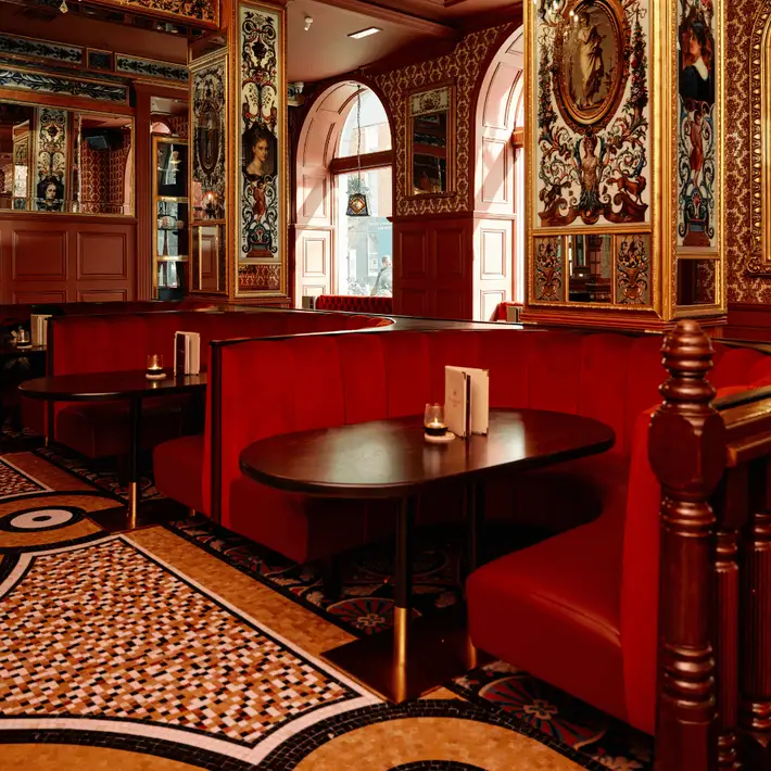 Corporate Team Building Events at The Imperial Hotel | Dynamic Events | Restaurant area with red booth style seats