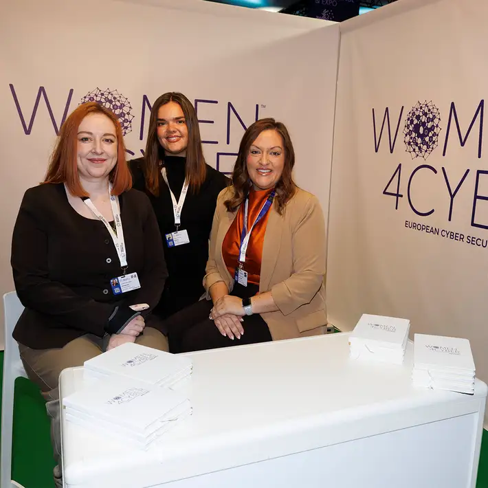 Three representatives at the Women4Cyber exhibition stand during the NCSC Cyber Expo at The Convention Centre Dublin.