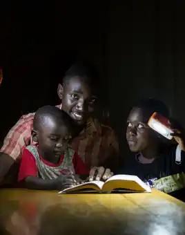 A family living in energy poverty with solarbuddy lights built by corporates in ireland