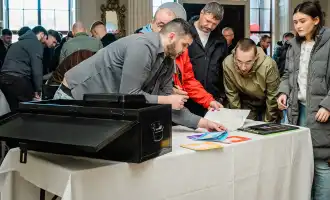 Corporate team building activity in Ireland with colleagues solving the Code Breaker indoor challenge