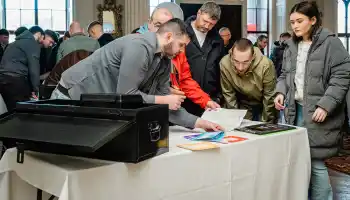 Corporate team building activity in Ireland with colleagues solving the Code Breaker indoor challenge