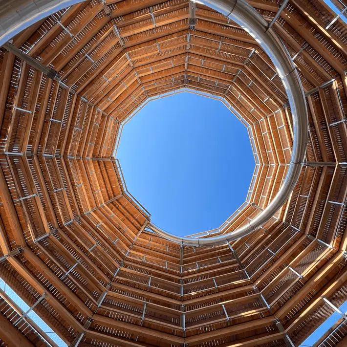 he spiral slide descending from the Viewing Tower at Beyond the Trees