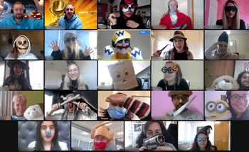 Halloween Virtual events screenshot from a computer with everyone dressed up through the screen  