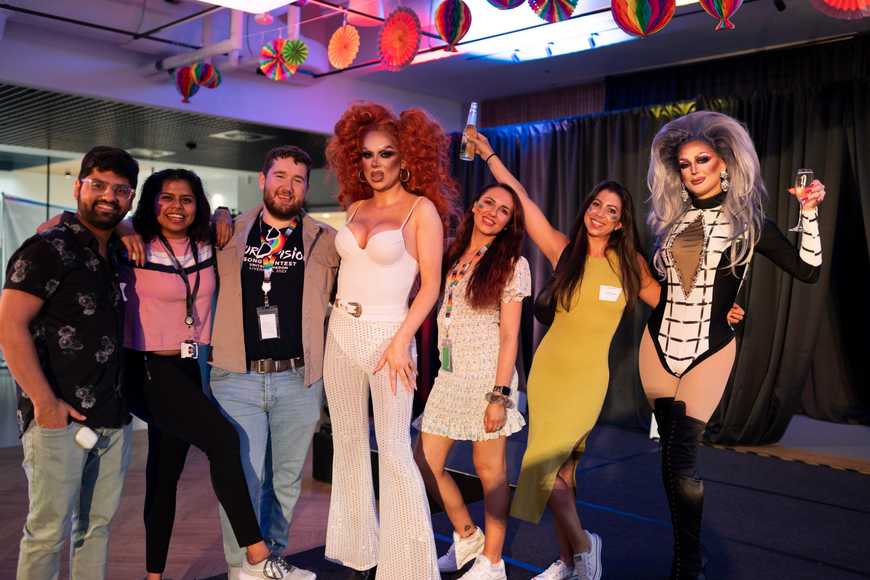 Drag queen entertainers at a corporate pride event 