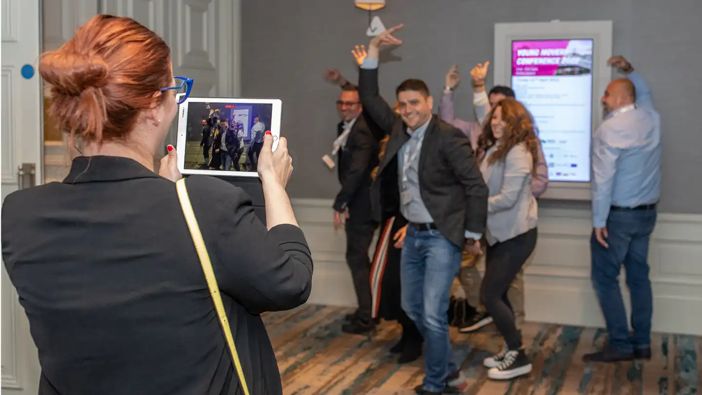 conference attendees taking part in a team building activity in ireland