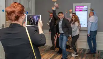conference attendees taking part in a team building activity in ireland