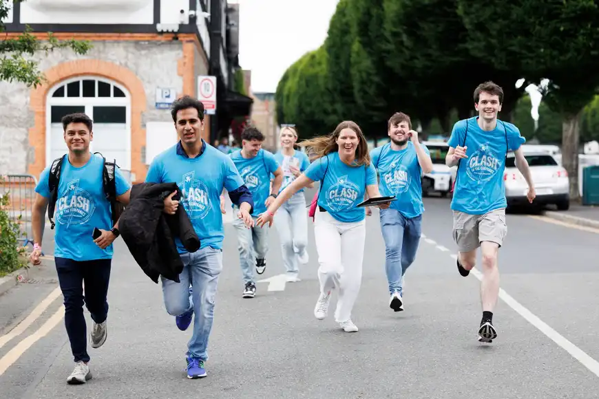 Corporate group in an outdoor setting as part of a creative treasure hunt challenge
