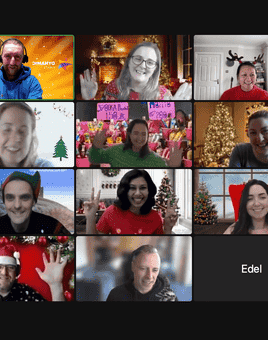 Remote team enjoying a virtual Christmas party on Zoom with festive backgrounds, Santa hats, and holiday decorations