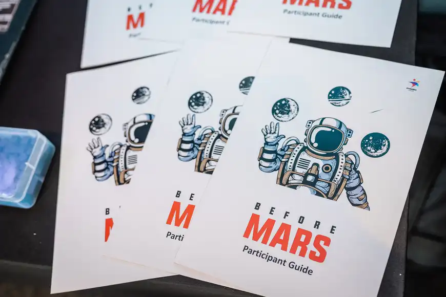 6 before mars leaflets with an astronaut on the front | Team training Belfast