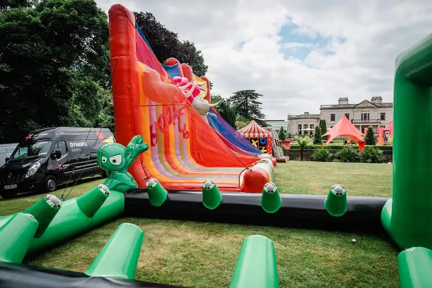 Inflatable giant games at a corporate summer team building event in Northern Ireland