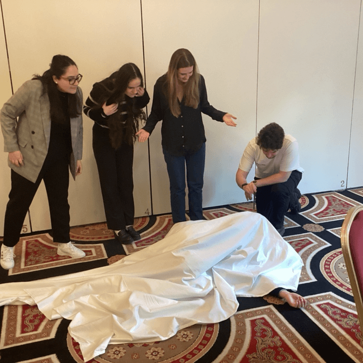 Team members collaborating on completing the picture and video tasks