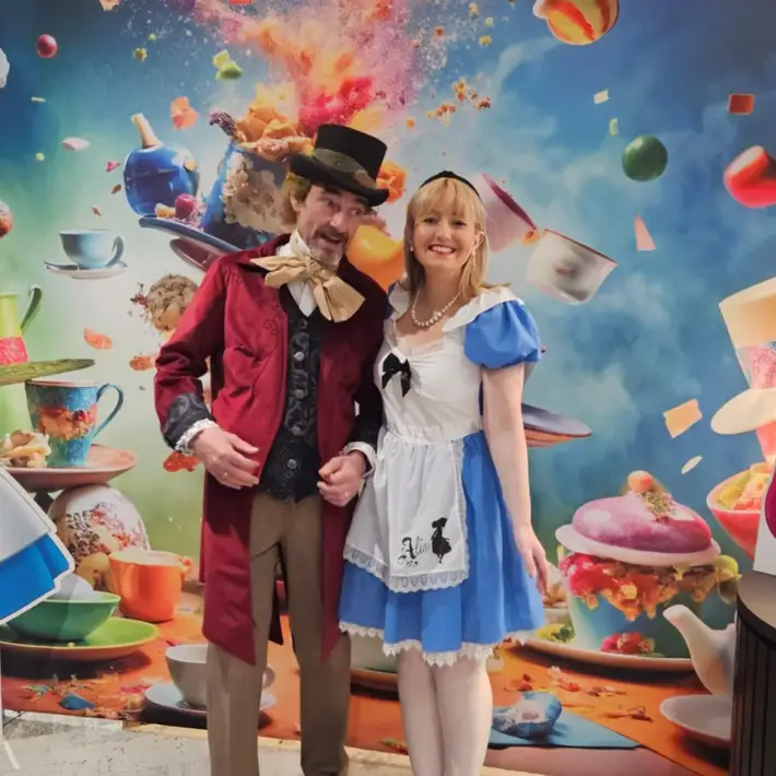 alice and the mad hatter posing 