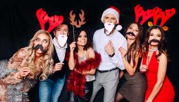 People Wearing Christmas Costumes