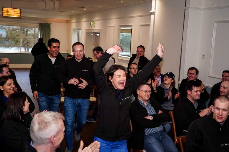 Team building event in Shannon with employees celebrating success at a company activity