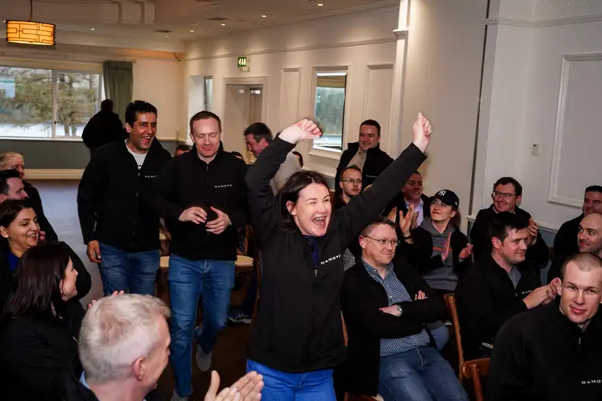 Team building event in Shannon with employees celebrating success at a company activity