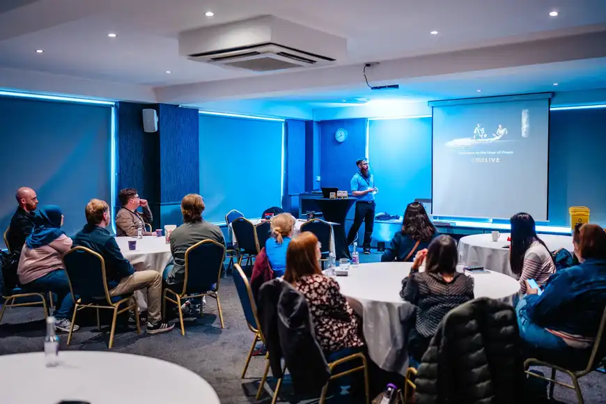 Corporate leaders listening to a presentation during an executive retreat in Ireland