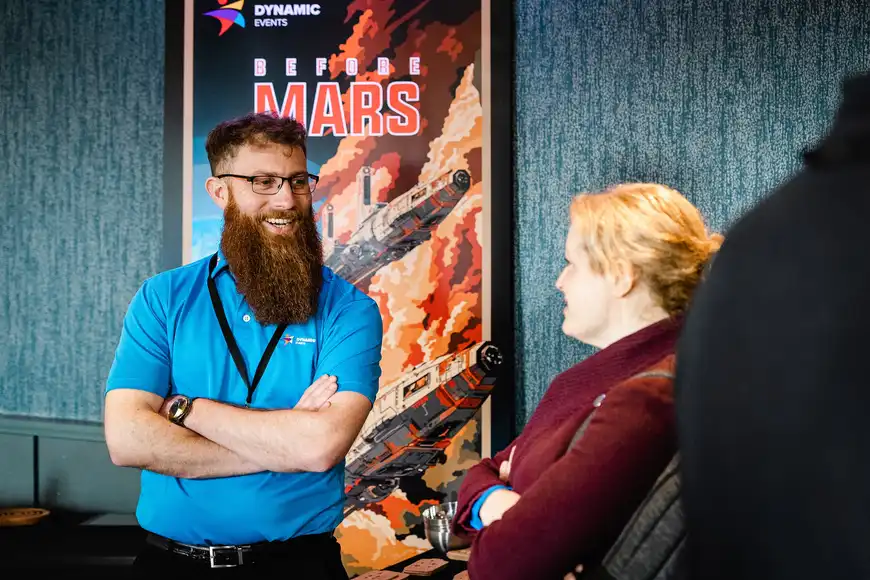 Niall engaging with clients, explaining the Before Mars team training experience.